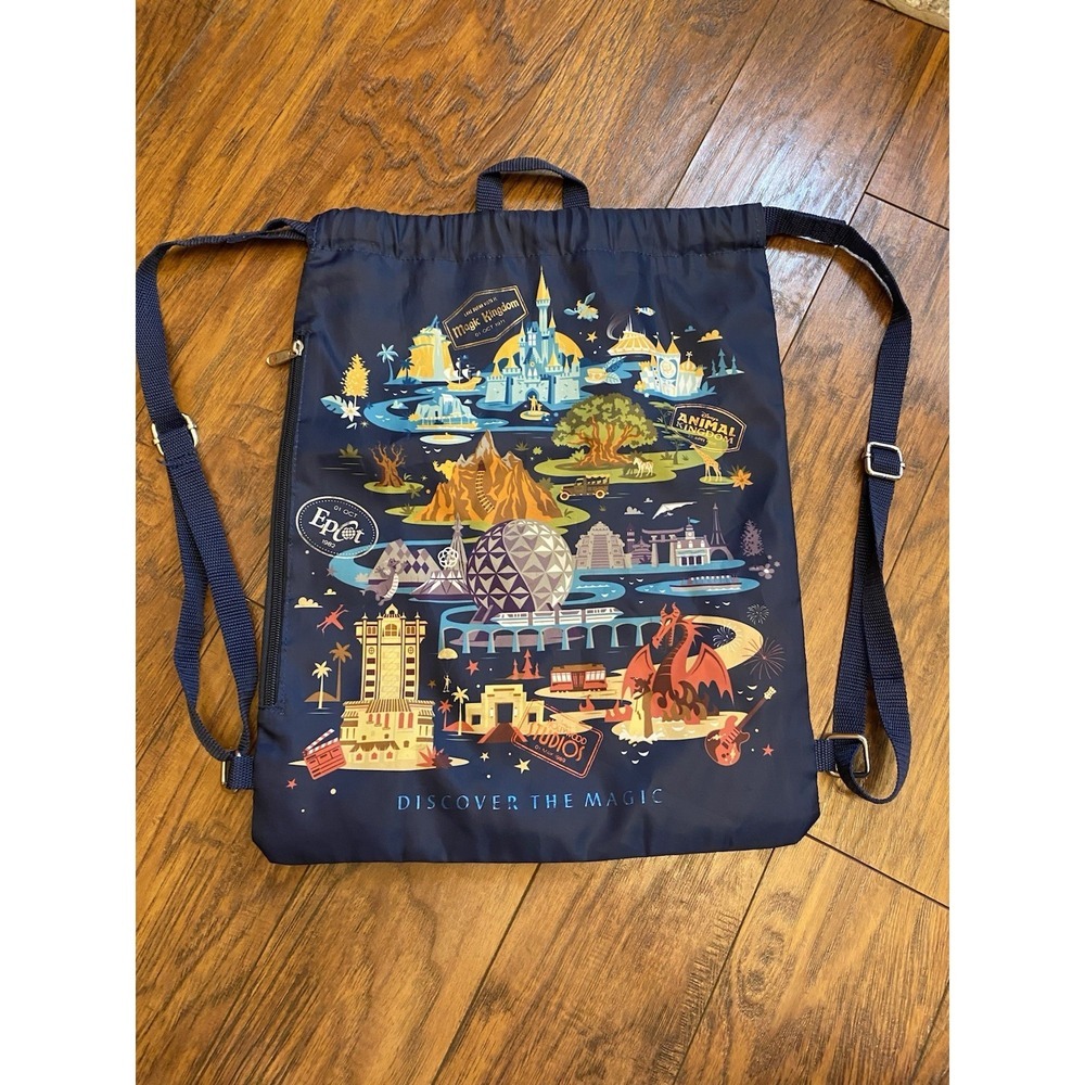 NWOT Disney Parks Drawstring Backpack Discover The Magic Blue Zipper Pocket Bag